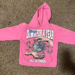 Pink down for a year time a tell hoodie